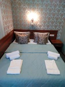 Posteľ alebo postele v izbe v ubytovaní Mini-Hotel Aska