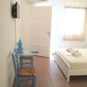 Cama ou camas em um quarto em Chaniotis Studios