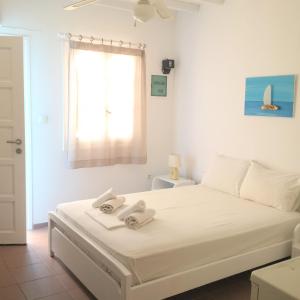 Cama ou camas em um quarto em Chaniotis Studios
