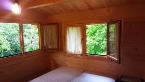 Postel nebo postele na pokoji v ubytování Camping Camaldoli