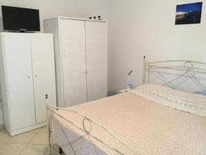 Postel nebo postele na pokoji v ubytování Casa Eleonora