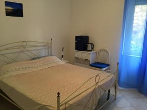 Postel nebo postele na pokoji v ubytování Casa Eleonora