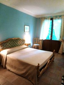 Postel nebo postele na pokoji v ubytování Cortebella B&B Rimini
