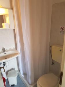 A bathroom at Efstathiou Mihail Studios and Apartments
