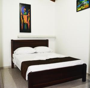 Postel nebo postele na pokoji v ubytování Apartahotel San Miguel