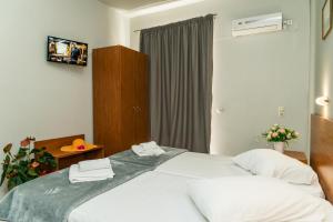 Letto o letti in una camera di Laganas Dreams 2