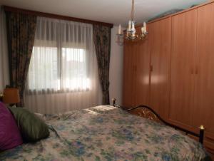 Postel nebo postele na pokoji v ubytování Calafell Residencial