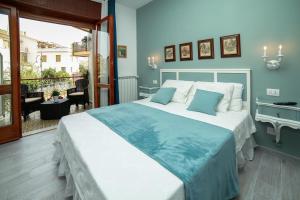 Postel nebo postele na pokoji v ubytování Casa Minna - De Vivo Realty Sant'Agnello