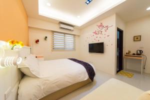 Cama o camas de una habitación en 醇境民宿 Pure B&B