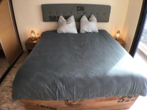 Postel nebo postele na pokoji v ubytování Guesthouse-TheView
