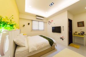 Cama o camas de una habitación en 醇境民宿 Pure B&B