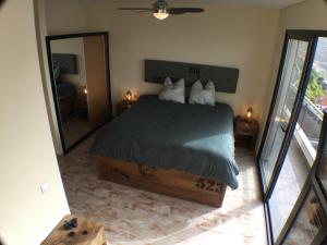 Postel nebo postele na pokoji v ubytování Guesthouse-TheView