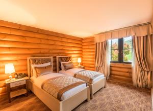 Postel nebo postele na pokoji v ubytování Quba Palace Hotel & Golf Resort + 37 fotografií