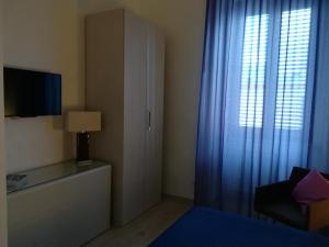 Posteľ alebo postele v izbe v ubytovaní Affittacamere Massimo D'Azeglio