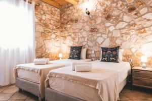 Postel nebo postele na pokoji v ubytování Villa Dimitris