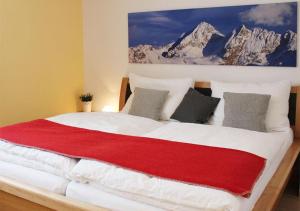 Postel nebo postele na pokoji v ubytování Appartements Naturnah