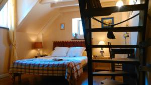 En eller flere senge i et værelse på Maison La Luzienne - Lou Astiou