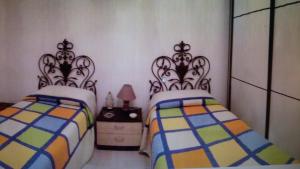 A bed or beds in a room at salento in relax