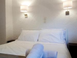 Posteľ alebo postele v izbe v ubytovaní Auberge 32 Old Town