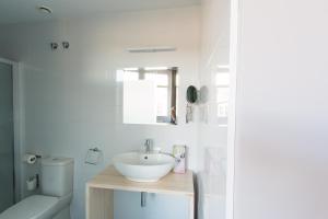Ванная комната в Bilbao City Rooms +20 фотографий