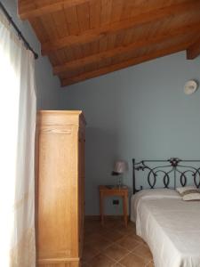 Postel nebo postele na pokoji v ubytování B&B PIBITZOI