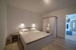 Postel nebo postele na pokoji v ubytování Sunset House