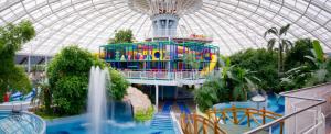 a large water park with a water slide at Gina Apartman in Debrecen