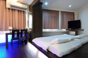 TV a/nebo společenská místnost v ubytování Yuh-Tarng Hotel