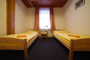 Postel nebo postele na pokoji v ubytování Penzion Sally
