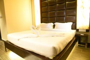 Cama ou camas em um quarto em Haywizz Havelock Island Resort