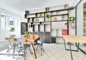 a dining room with a table and chairs at Ośrodek wypoczynkowy Balt-Tur Feel Well Resort in Jastrzębia Góra