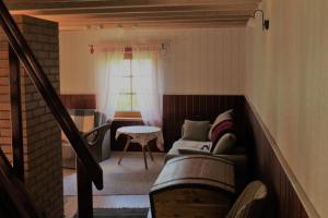 Postel nebo postele na pokoji v ubytování Posti Holiday Home