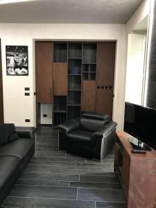 Televízia a/alebo spoločenská miestnosť v ubytovaní Loft Acaja