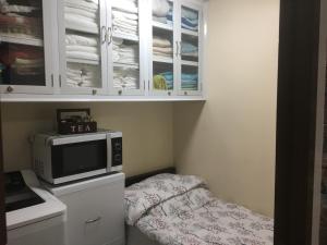 Ein Bett oder Betten in einem Zimmer der Unterkunft De Luxe 7QRS