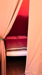 Cama o camas de una habitación en Camping Le Pesquier