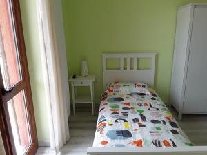 Ein Bett oder Betten in einem Zimmer der Unterkunft Tra MENTA e MELIGA