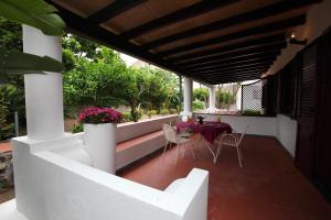 A seating area at Residence Hotel La Giara