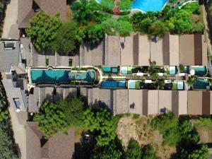an overhead view of a building with a train at Kaleydo Villas in Gili Trawangan