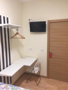 Μια τηλεόραση ή/και κέντρο ψυχαγωγίας στο JQC Rooms