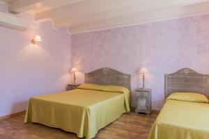 Voodi või voodid majutusasutuse B&B Apollo toas