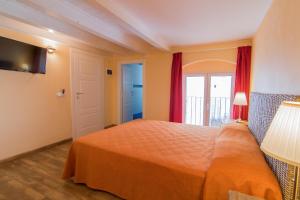 Voodi või voodid majutusasutuse B&B Apollo toas