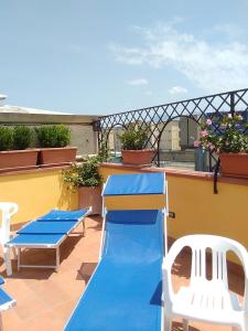 a playground with a slide on a roof at Home To Fly in Naples