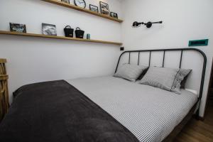 Cama ou camas em um quarto em Apartman Kika