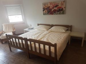 Postel nebo postele na pokoji v ubytování Apartmani Matko