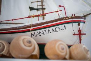 a boat with the name of marmalawi written on it at Hotel Mantalena in Antiparos Town