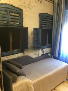 Da ö Vittorio SRL客房内的一张或多张床位