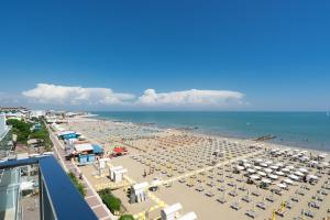 an aerial view of a beach with umbrellas at Hotel Elite in Caorle