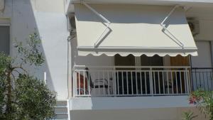 Balkón alebo terasa v ubytovaní White Apartment 70m from the sea