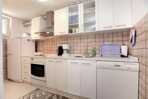 A cozinha ou cozinha compacta de Apartment Eva