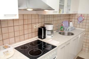 A cozinha ou cozinha compacta de Apartment Eva
